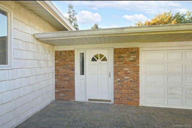 22 Pioneer Boulevard, South Huntington, NY 11746