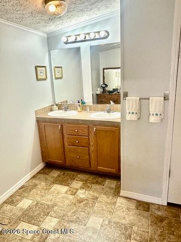 1418 Barefoot Circle, Barefoot Bay, FL 32976