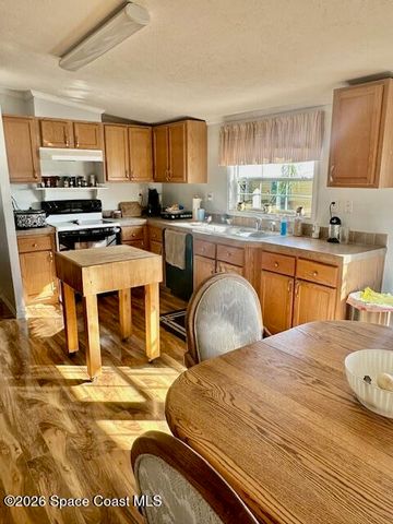 1418 Barefoot Circle, Barefoot Bay, FL 32976