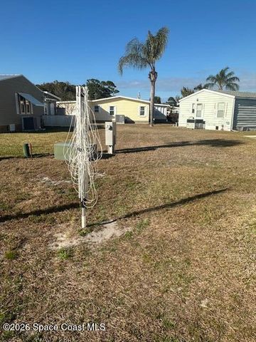 1418 Barefoot Circle, Barefoot Bay, FL 32976