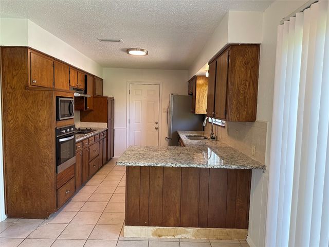 2818 Golfing Green Drive, Farmers Branch, TX 75234