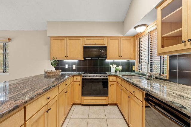 2 N Timber Top Dr, The Woodlands, TX 77380