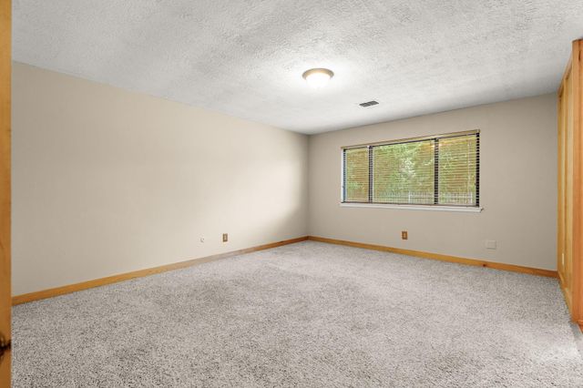 2 N Timber Top Dr, The Woodlands, TX 77380