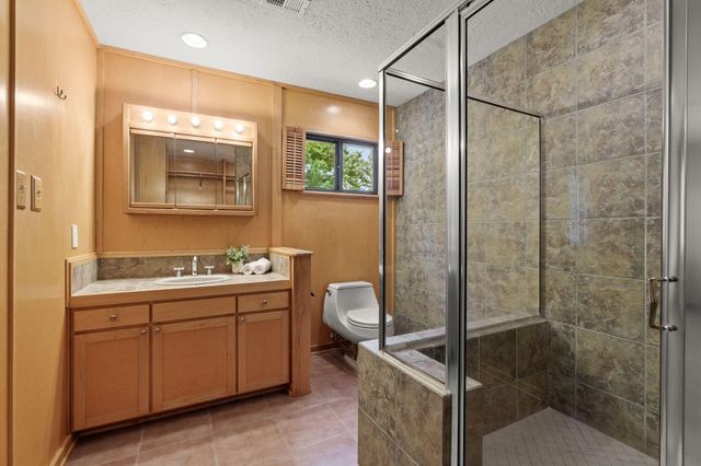 2 N Timber Top Dr, The Woodlands, TX 77380
