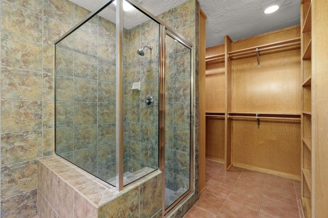2 N Timber Top Dr, The Woodlands, TX 77380