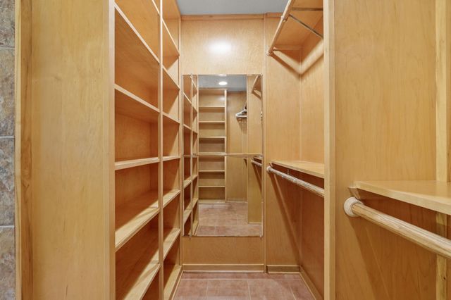 2 N Timber Top Dr, The Woodlands, TX 77380