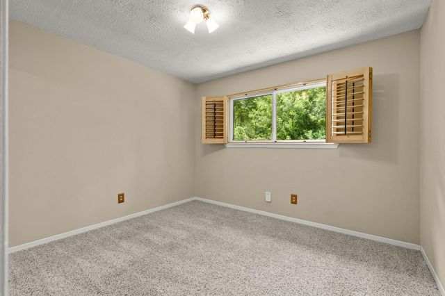 2 N Timber Top Dr, The Woodlands, TX 77380