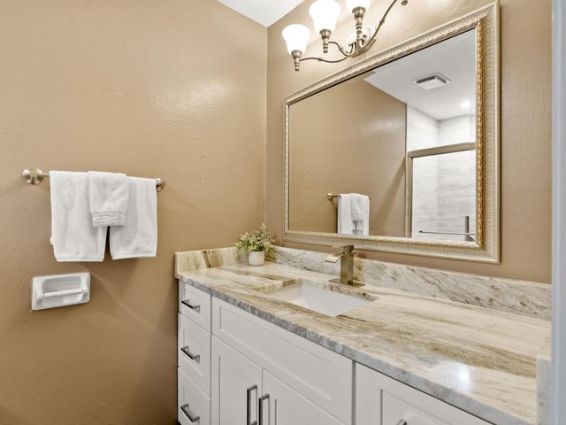 2 N Timber Top Dr, The Woodlands, TX 77380