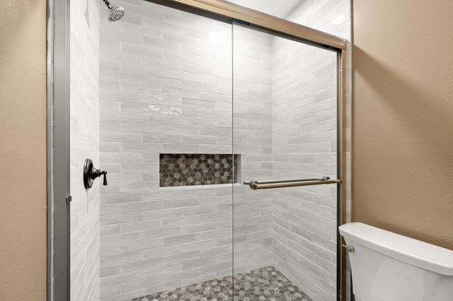 2 N Timber Top Dr, The Woodlands, TX 77380