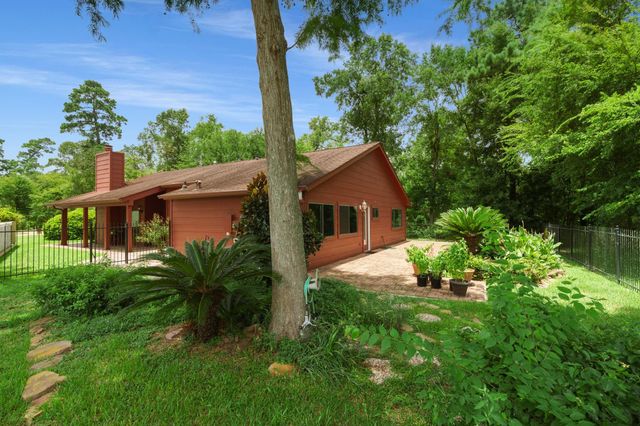 2 N Timber Top Dr, The Woodlands, TX 77380
