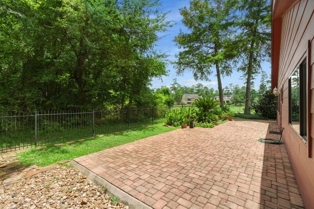 2 N Timber Top Dr, The Woodlands, TX 77380