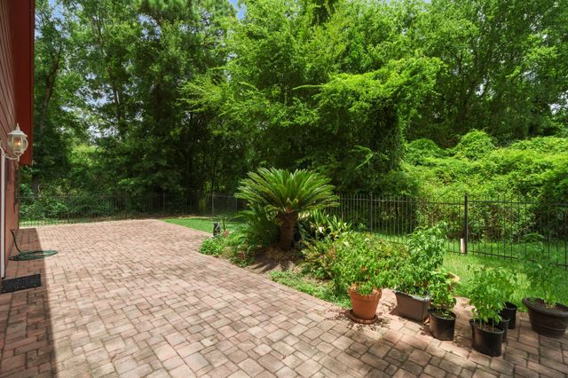 2 N Timber Top Dr, The Woodlands, TX 77380
