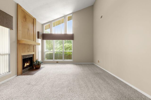 2 N Timber Top Dr, The Woodlands, TX 77380