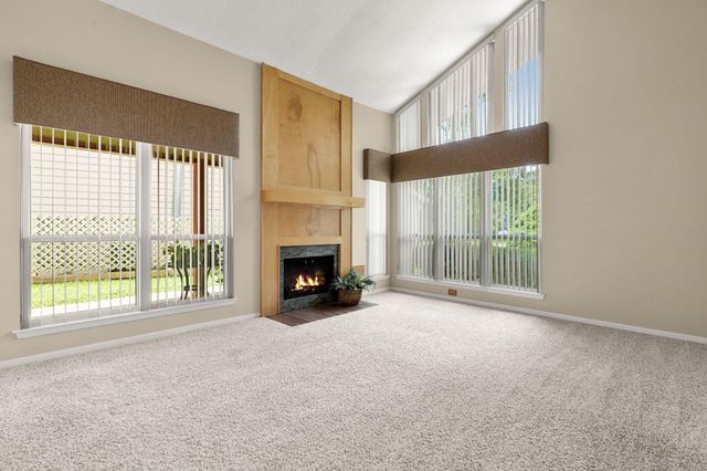 2 N Timber Top Dr, The Woodlands, TX 77380