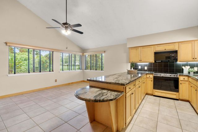 2 N Timber Top Dr, The Woodlands, TX 77380