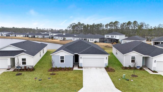 62 WANDERING CREEK WAY, Palm Coast, FL 32164