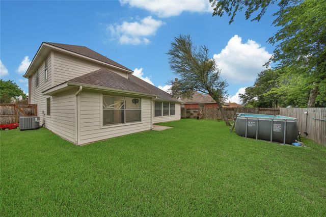 30702 Country Meadows Drive, Tomball, TX 77375