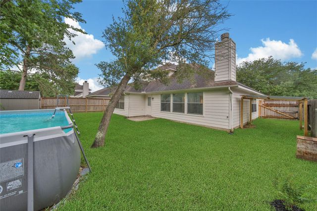 30702 Country Meadows Drive, Tomball, TX 77375