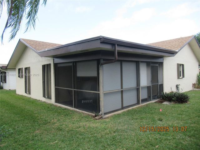 6310 Tall Cypress Cir, Green Acres, FL 33463