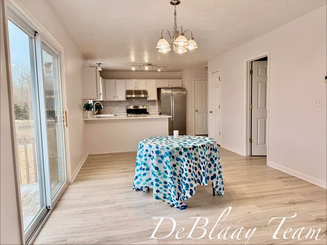 6873 Peninsula Drive Ne, Courtland Twp, MI 49341