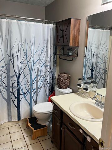 1041 FAIRWAY TRAILS Drive, Brighton, MI 48116