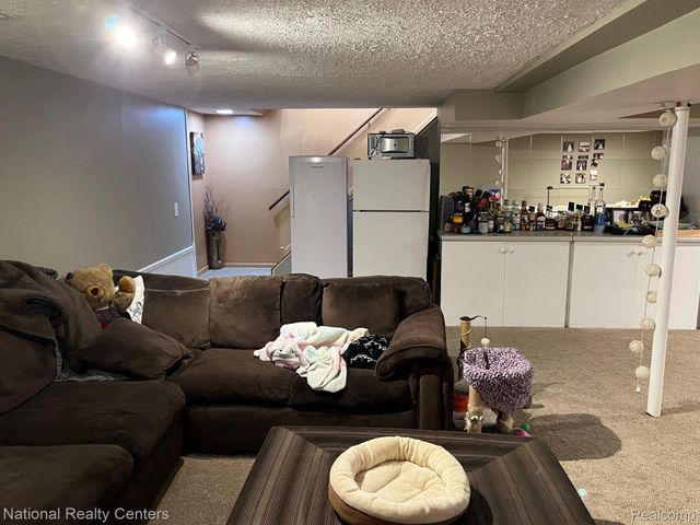 1041 FAIRWAY TRAILS Drive, Brighton, MI 48116