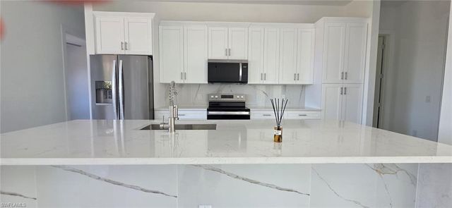 3718 8th ST SW, Lehigh Acres, FL 33976