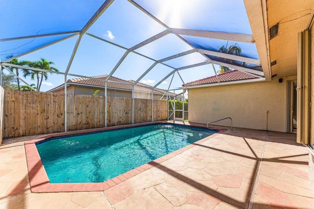 5872 NW 73rd Court, Parkland, FL 33067