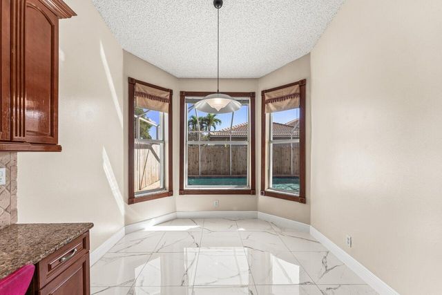 5872 NW 73rd Court, Parkland, FL 33067