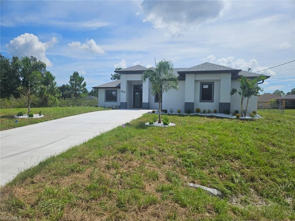 1102 Poinsettia AVE, LEHIGH ACRES, FL 33972 — exterior