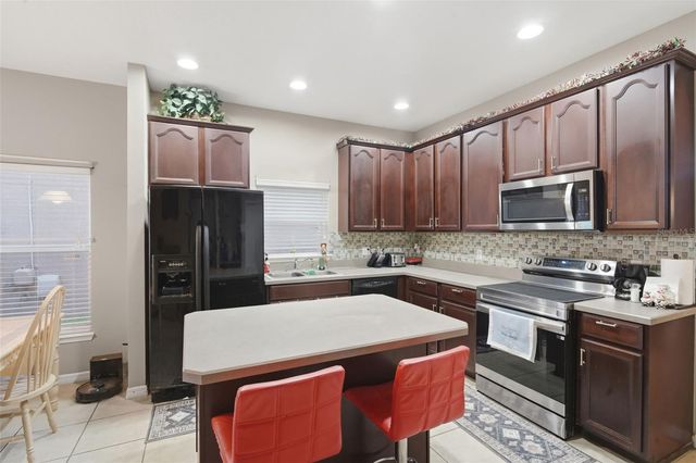1676 CANOE CREEK FALLS DRIVE, Orlando, FL 32824