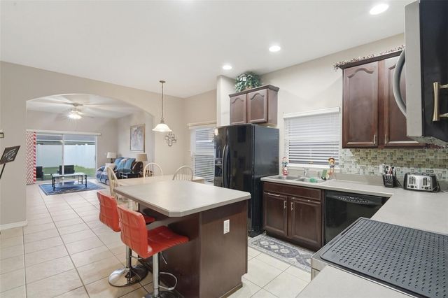 1676 CANOE CREEK FALLS DRIVE, Orlando, FL 32824