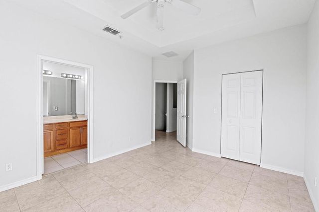 1002 Pipers Cay Drive, West Palm Beach, FL 33415