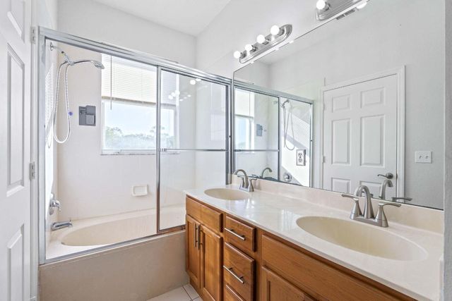 1002 Pipers Cay Drive, West Palm Beach, FL 33415