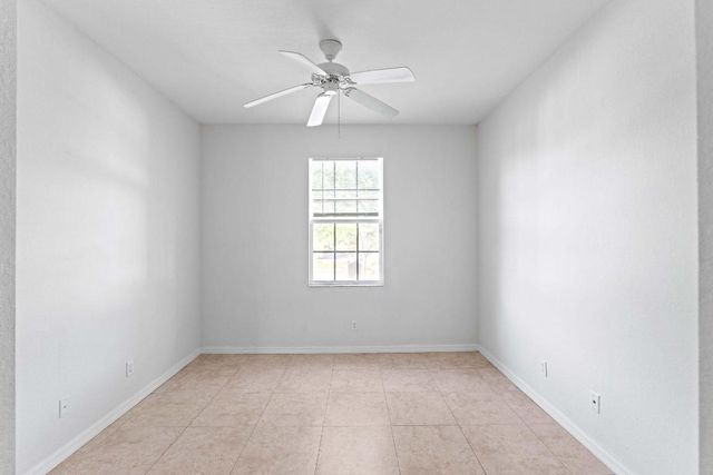 1002 Pipers Cay Drive, West Palm Beach, FL 33415