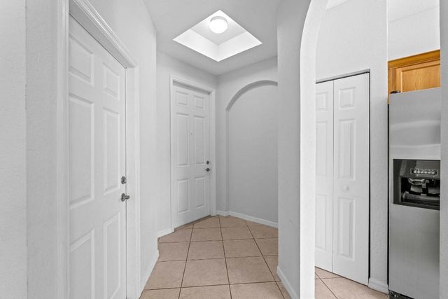 1002 Pipers Cay Drive, West Palm Beach, FL 33415