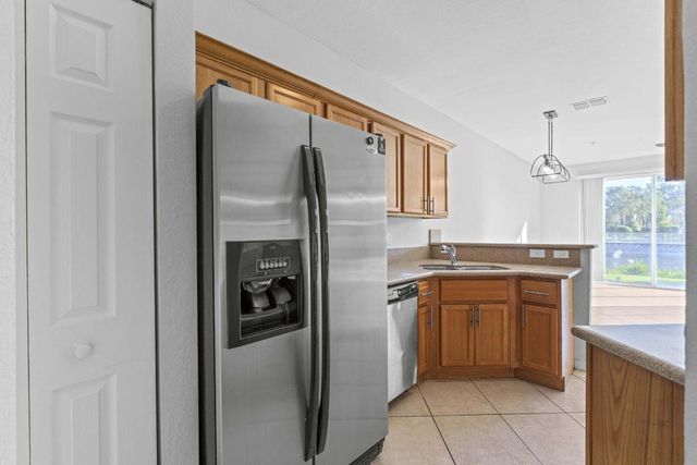 1002 Pipers Cay Drive, West Palm Beach, FL 33415