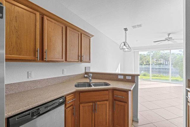 1002 Pipers Cay Drive, West Palm Beach, FL 33415