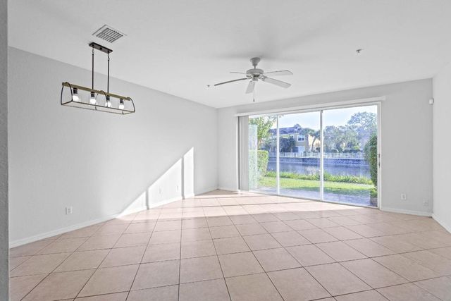 1002 Pipers Cay Drive, West Palm Beach, FL 33415