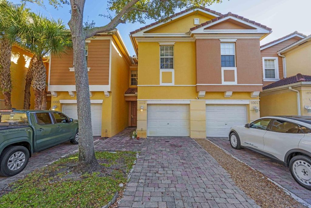 1002 Pipers Cay Drive, West Palm Beach, FL 33415