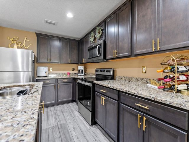 8975 SOUTHERN CHARM CIRCLE, Brooksville, FL 34613