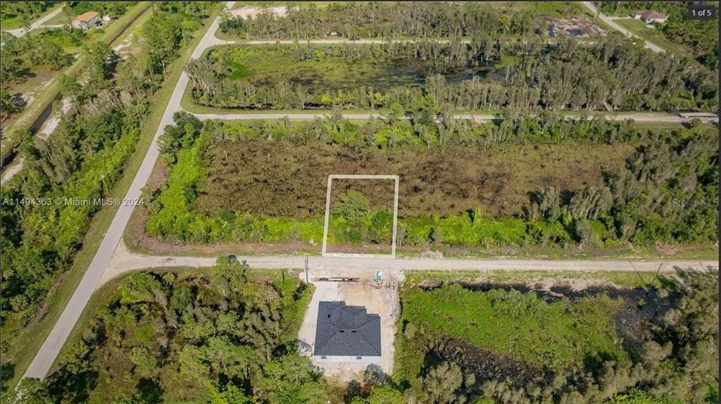 853 BELDEN AVENUE, Lehigh Acres, FL 33974