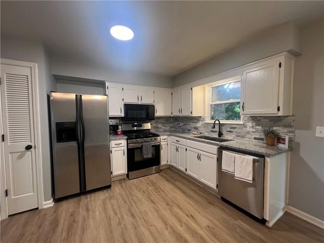 1314 R D Mize Road, Grain Valley, MO 64029