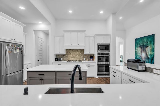 23419 Timbarra Glen Drive, New Caney, TX 77357