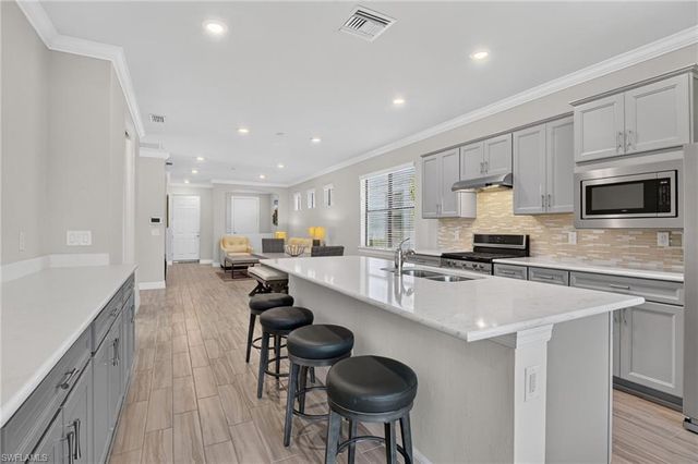 7237 Wilton DR, Naples, FL 34109