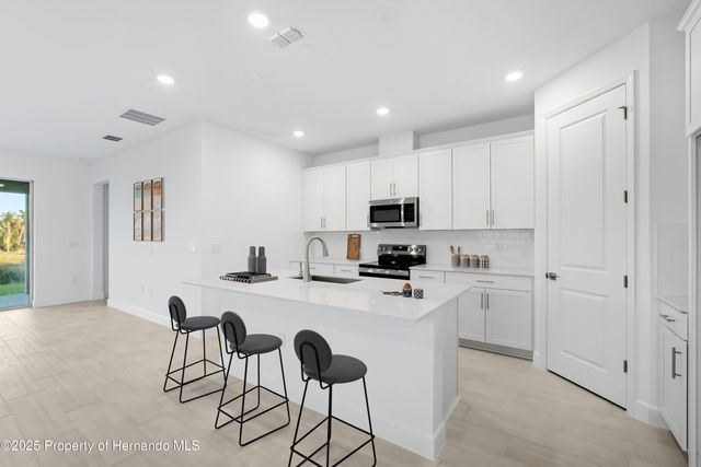 9120 PLAYERS Drive, Weeki Wachee, FL 34613