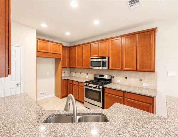 15618 Whisper Woods Drive, Cypress, TX 77429