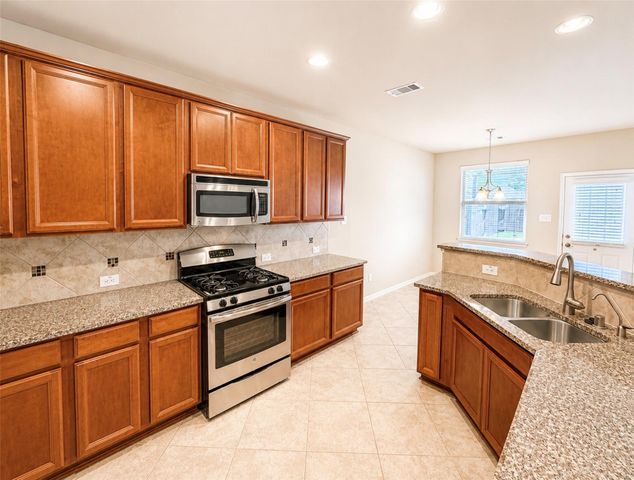15618 Whisper Woods Drive, Cypress, TX 77429