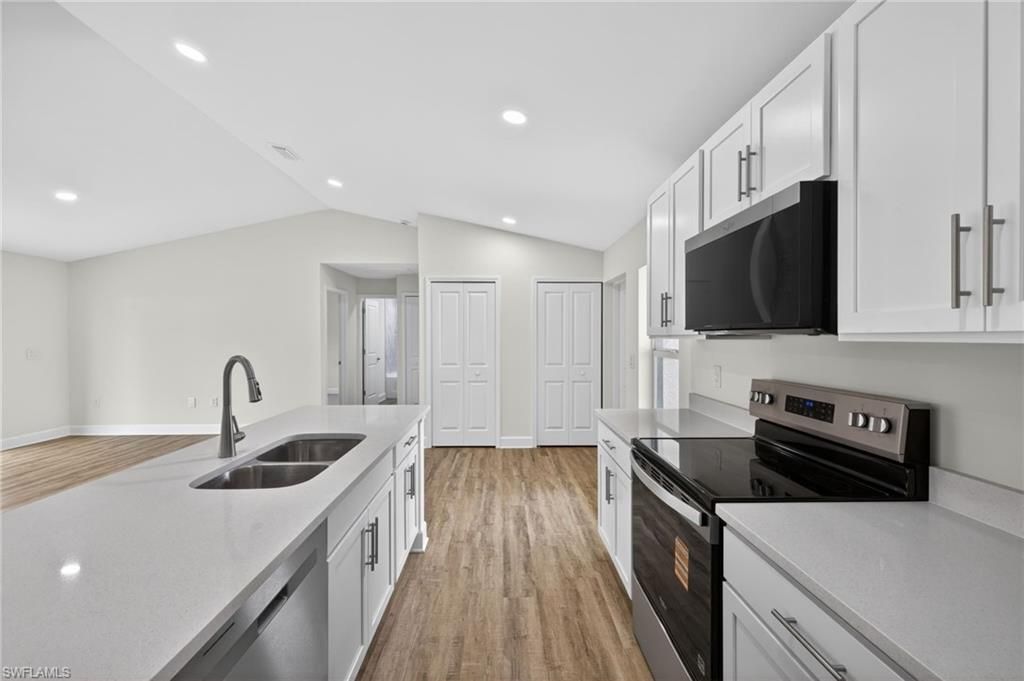 Image 3 of property listing at 2426 NW 19th AVE, Cape Coral, FL 33993