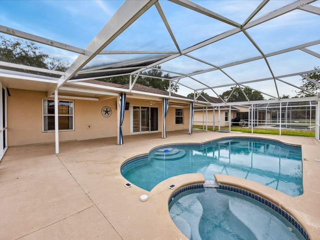 703 SUNRIDGE WOODS BOULEVARD, Davenport, FL 33837